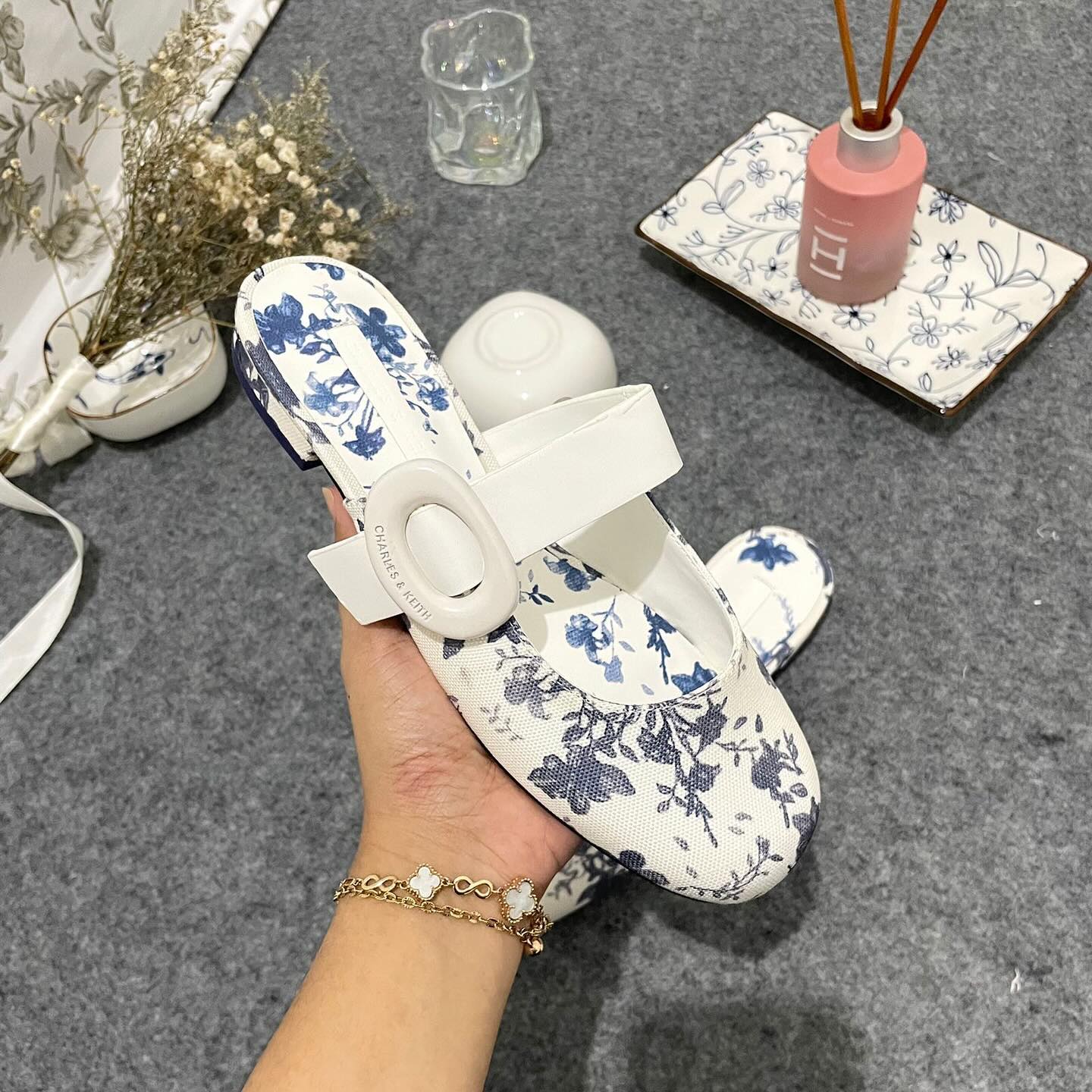 Premium floral-print mules Material Linen with oval-buckle straps complement